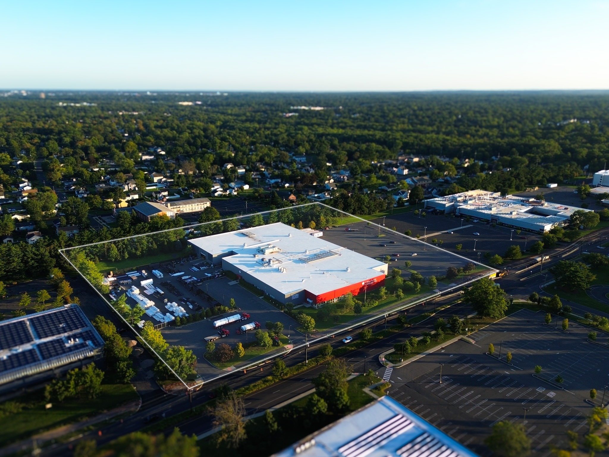 Aerial of 180 Centennial Avenue with an illustrative property outline